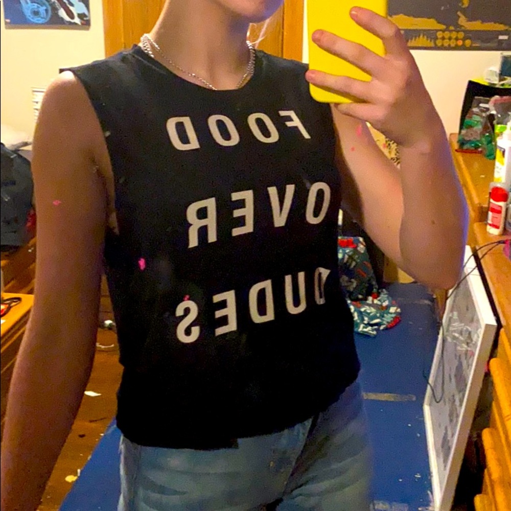 Loose, black “food over dudes” tank